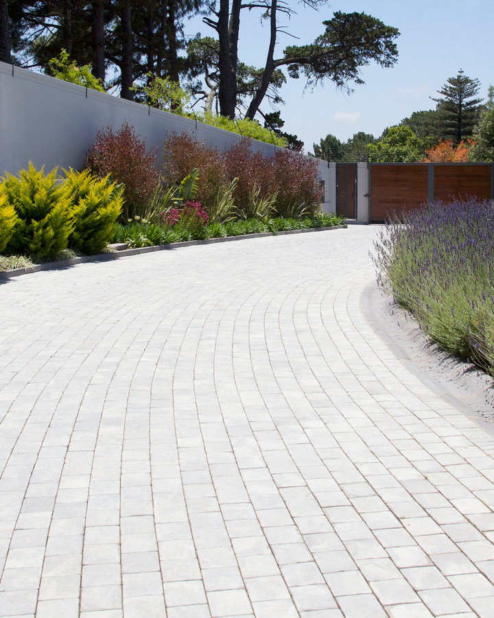 Block paved driveway with planted borders