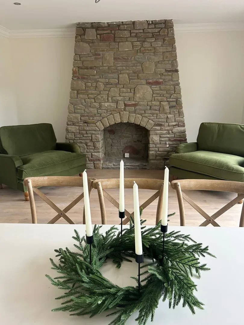 Completed living room with stone fireplace by JRD Construction Bridgend